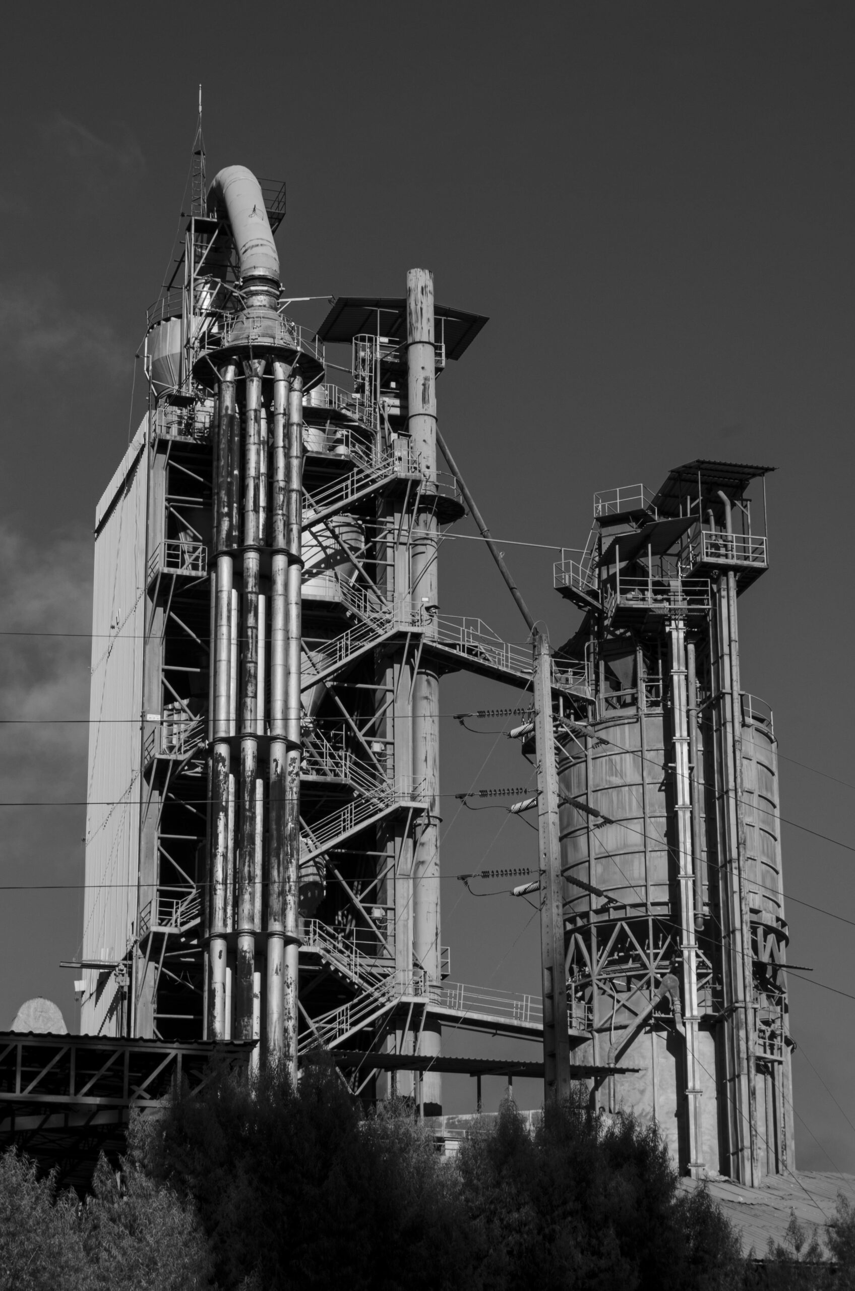 Dramatic black and white photo of an industrial plant in Cuenca, Ecuador.